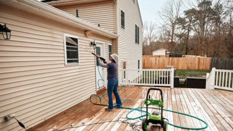 Exterior Home Being Pressure Washed